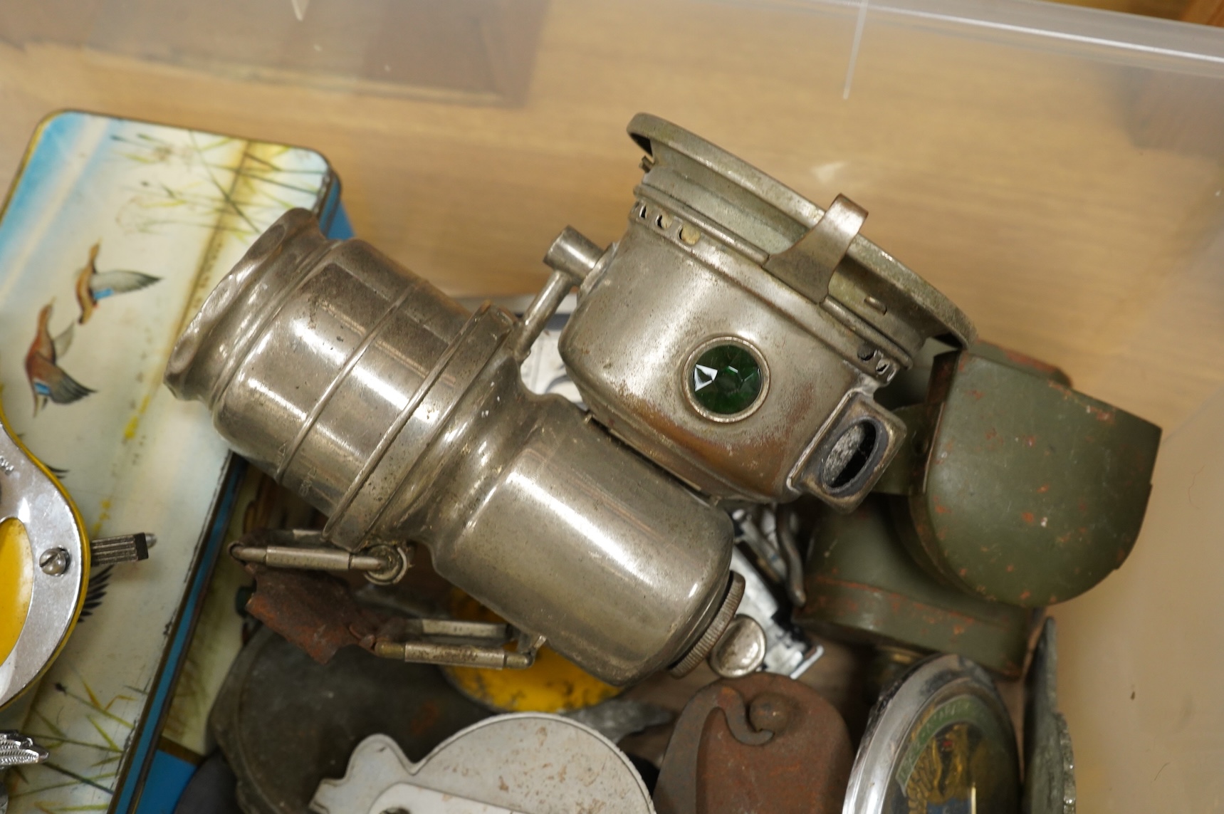 Automobilia items, including six mid-20th century car badges; AA, RAC, the Royal Sussex regiment, East Sussex, etc., together with a Smiths dashboard clock, a Rolls-Royce plaque, two early motoring lamps, a W&R Jacob & C